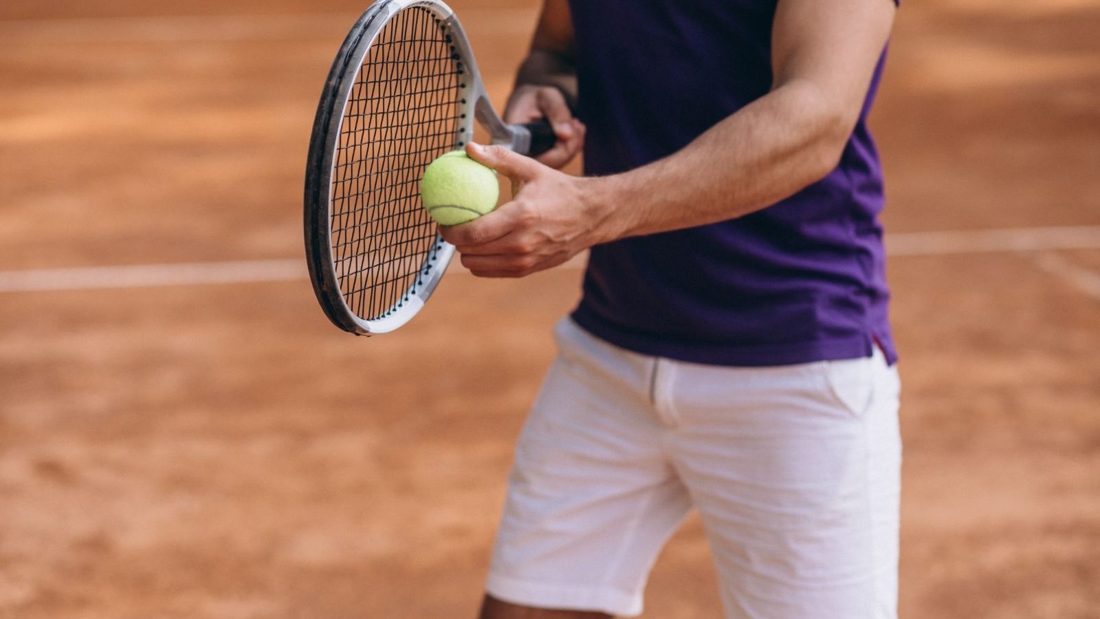 young-man-tennis-player-court-tennis-racket-close-up(1)