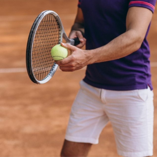 young-man-tennis-player-court-tennis-racket-close-up(1)